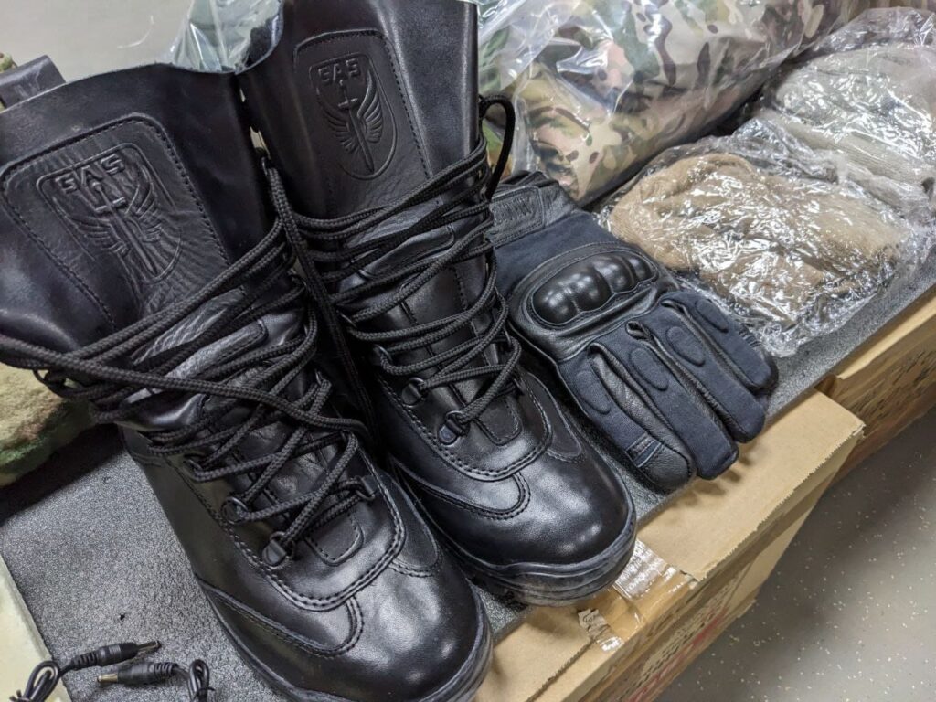 An image displaying military boots issued to Wagner Group recruits at the Molkino training center in Krasnodar. 